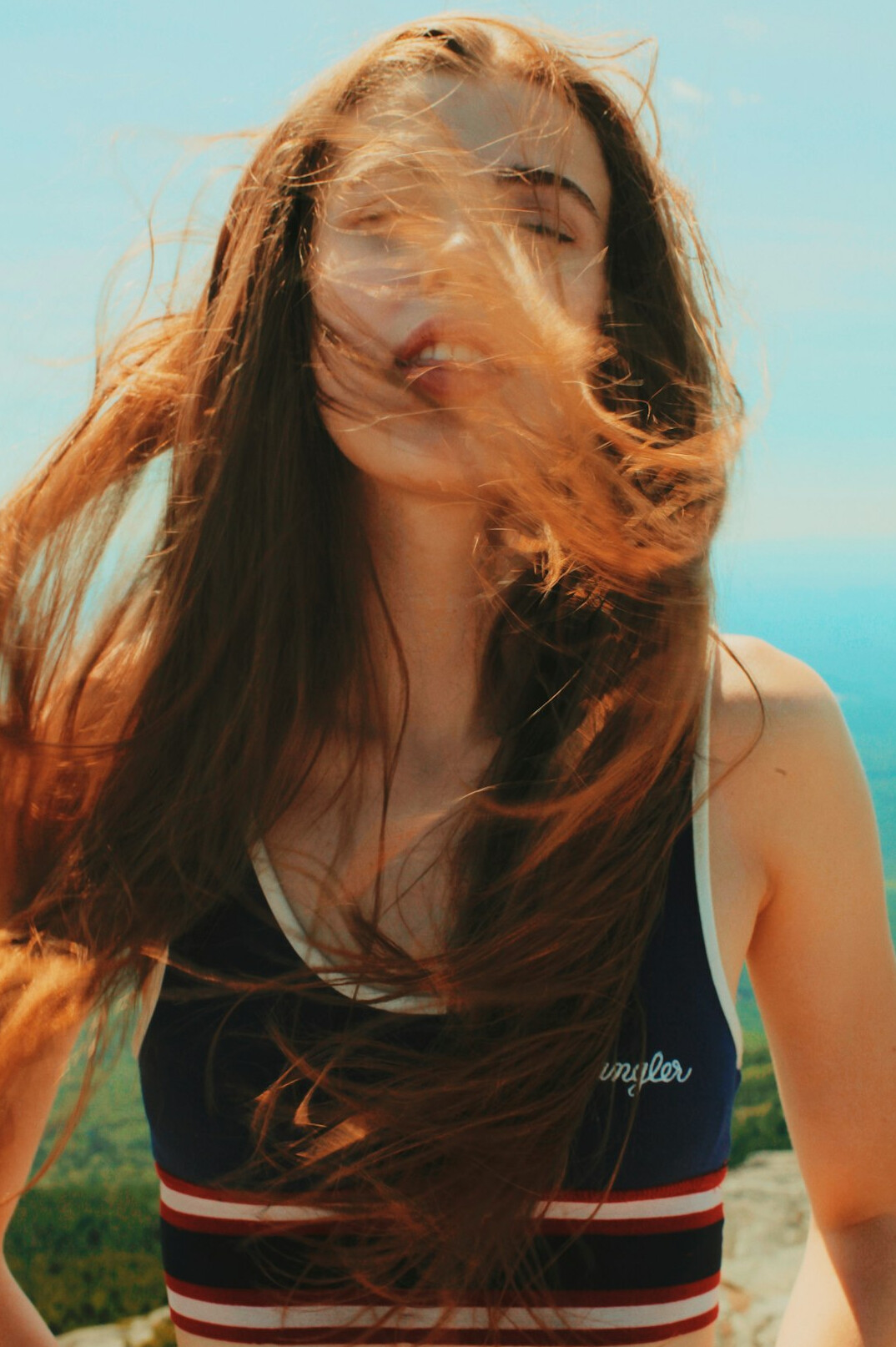 Portrait of a smiling woman with long hair
