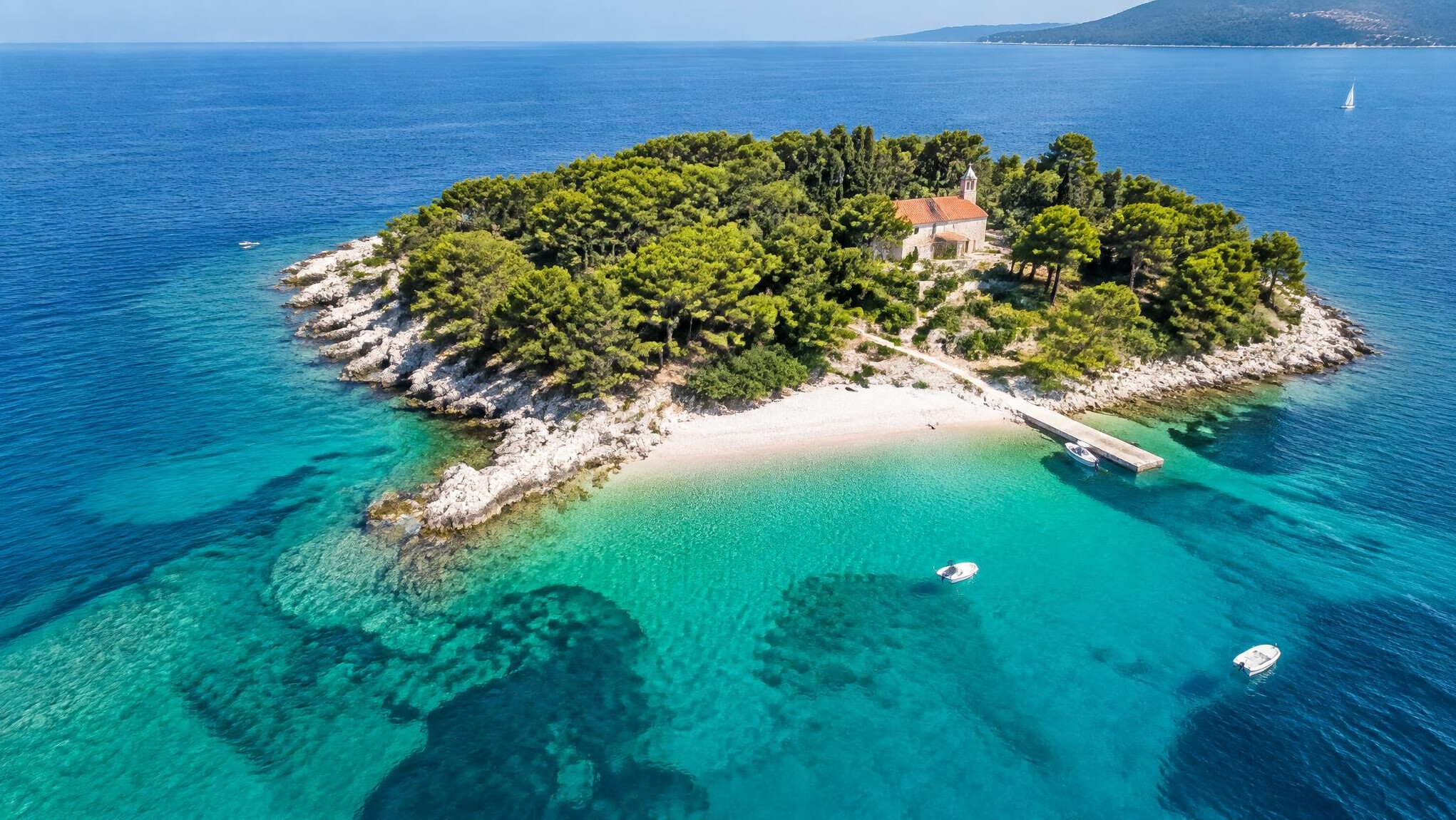 Aerial view of an island and clear sea